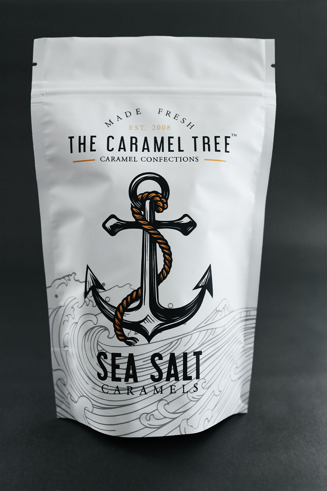 THE CARAMEL TREE SEA SALT CARAMEL POUCH DARK